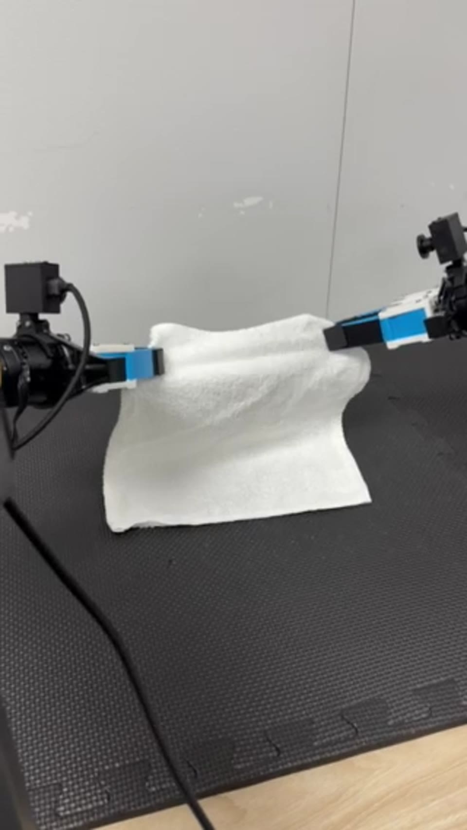 Dual-arm towel manipulation on physical PiPER arms